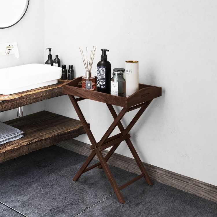 Solid teak wood tray table with removable top, featuring a sleek finish and foldable design for versatile outdoor use.