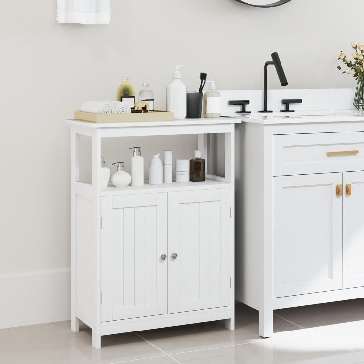 White bathroom floor cabinet featuring a spacious top, ideal for toiletries, with two doors for concealed storage.