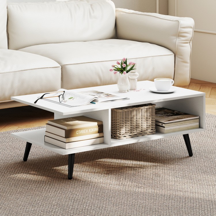 Mid Century Modern rectangle coffee table in white with 2 open compartments and tapered metal legs for stylish storage.