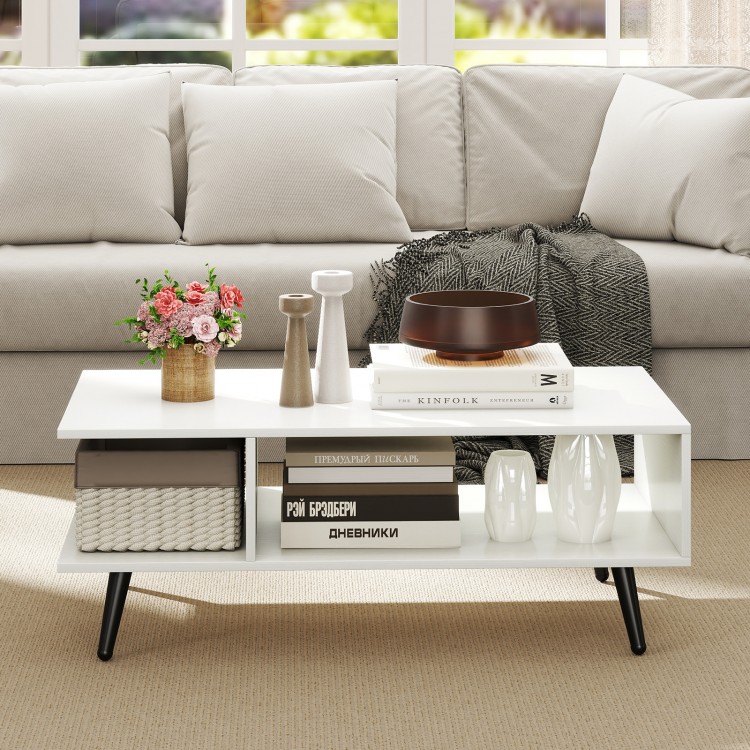 Mid century modern white coffee table with 2 open compartments and tapered metal legs, ideal for living room.