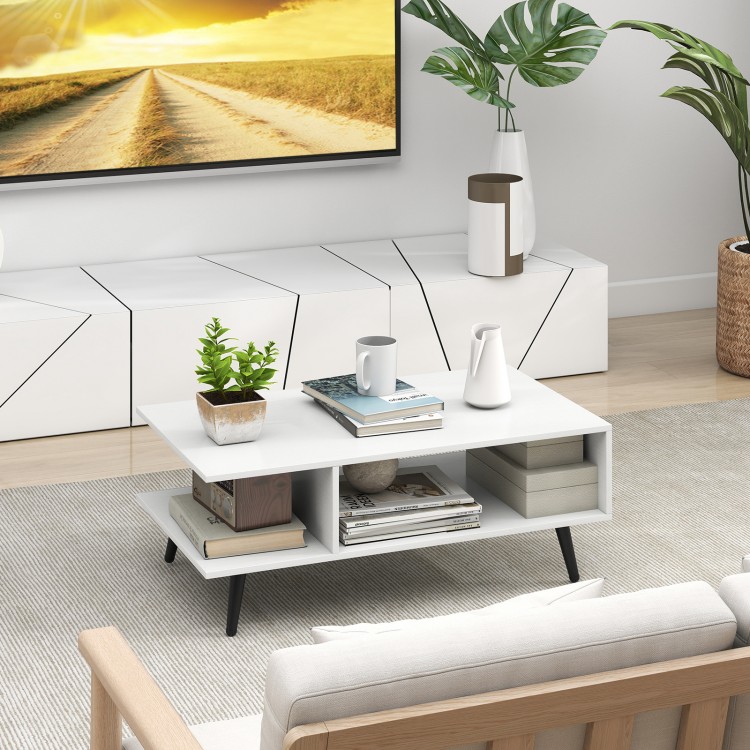 Mid Century Modern rectangle coffee table featuring a spacious white top and two open compartments for organized living.