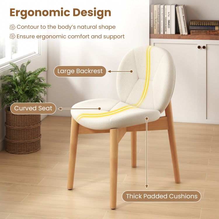 Curved seat and large backrest of a white dining chair with rubber wood legs, designed for ergonomic comfort and.