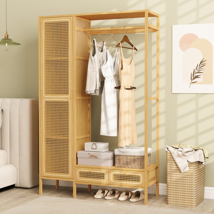 Bamboo clothing rack with cabinet and drawers, featuring a hanging rod for organized storage and a natural finish.