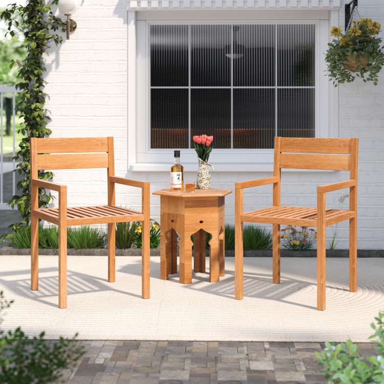 Teak wood armchairs with natural finish and armrests, perfect for outdoor patio dining or relaxation.