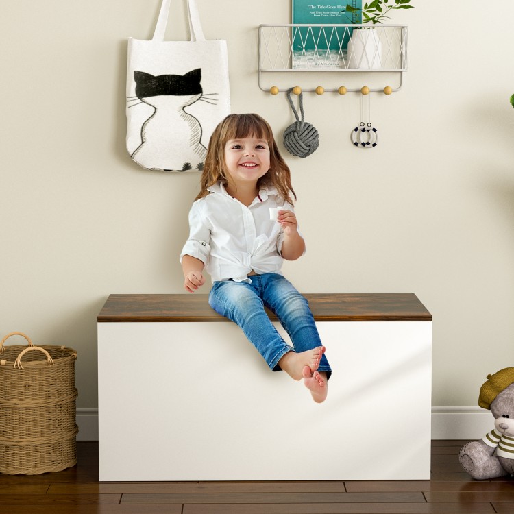 Flip-top storage chest in white with a rustic brown lid, ideal for kids' toys and shoes, used as a bench.