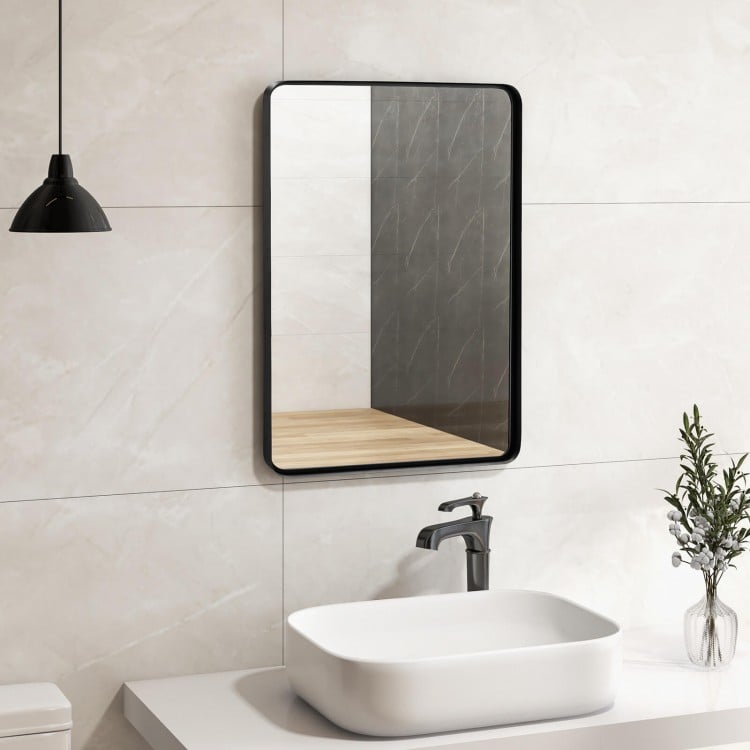 Rectangular wall mount bathroom mirror with solid steel frame, showcasing premium glass and versatile hanging options.