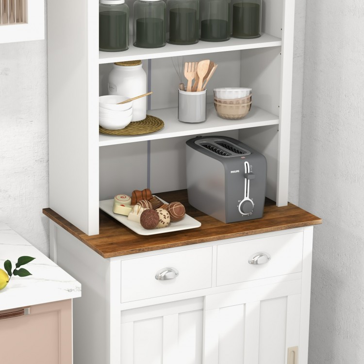 Freestanding kitchen pantry with hutch, sliding doors, and drawers, offering ample storage and a stylish countertop.