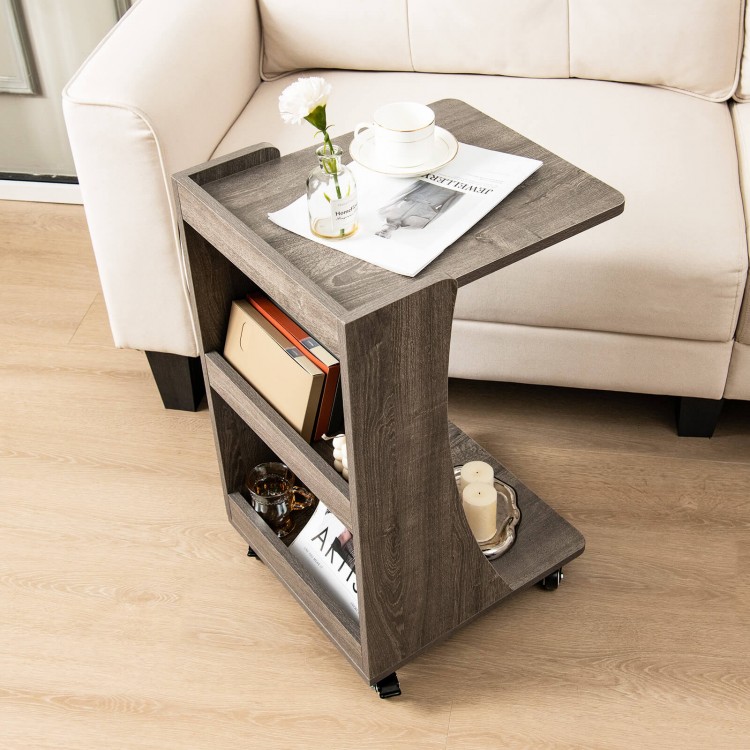 C-shaped gray rolling end table with 2-tier shelves and compartments, perfect for small spaces beside a sofa.