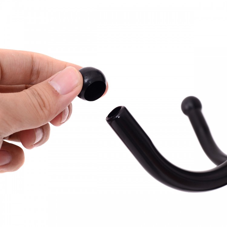 Close-up of a hand holding a cap for the Metal Coat Rack with 12 hooks, featuring sturdy powder-coated steel.