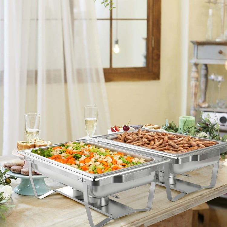Stainless steel 9-quart chafing dishes with food, ideal for parties and buffets, featuring scald-proof handles.