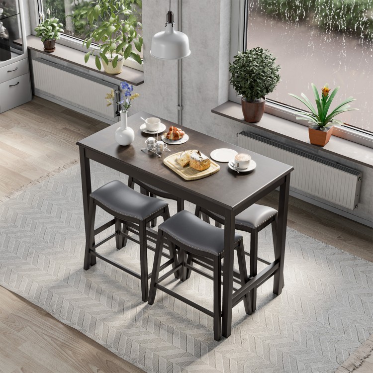 Bar table set with spacious top and four upholstered stools, ideal for modern dining in kitchens or bistros.