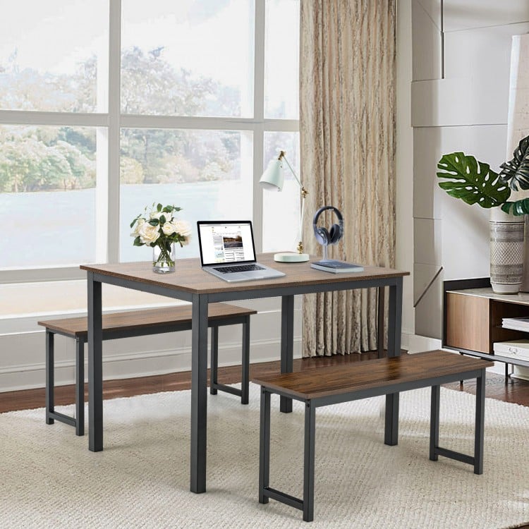 Brown dining table set with two benches shown in a stylish living room, perfect for modern dining and compact spaces.