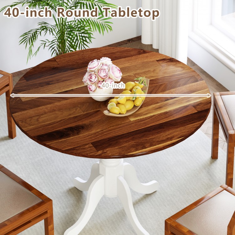 Round wooden dining tabletop with a walnut finish, featuring curved trestle legs, suitable for kitchens and dining.