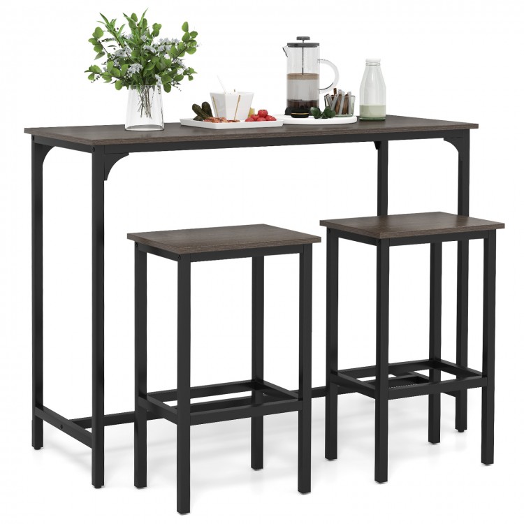 Side view of the industrial counter-height dining table, showcasing its spacious gray tabletop and sturdy metal frame.