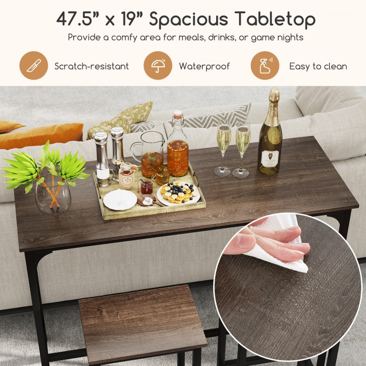 Spacious 47.5" gray dining table with two bar stools, waterproof surface, perfect for meals and drinks at home.