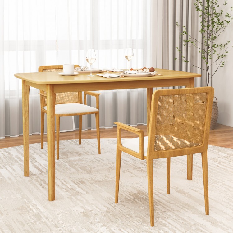 Natural 48-inch solid wood dining table with rubber wood legs, featuring a spacious tabletop for family dining.