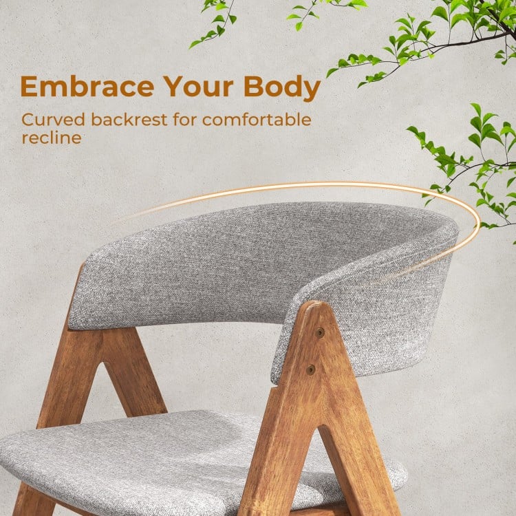 Curved backrest accent chair in walnut and grey, designed for comfort and support in dining or reception areas.