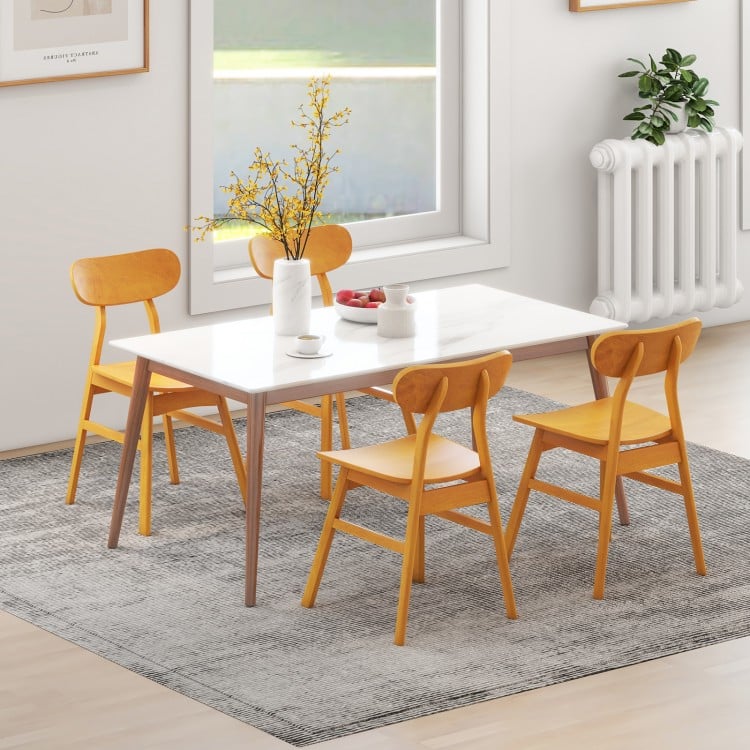 Set of 2 modern dining chairs with curved backrest in natural rubber wood, perfect for kitchen or dining room use.