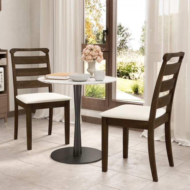 Walnut wooden dining chairs with white padded seats, featuring a retro design, perfect for dining rooms or cafes.