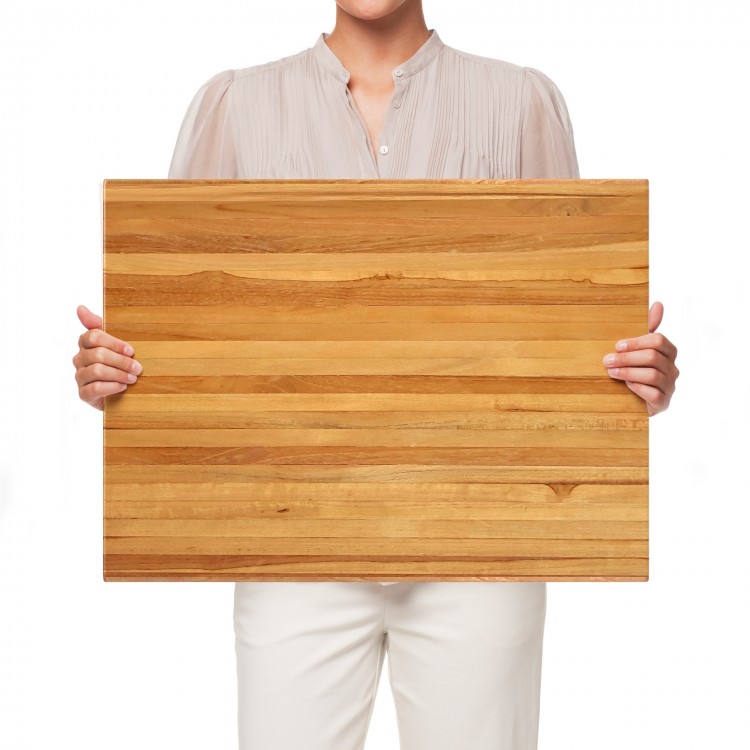 Extra large 24" reversible teak wood cutting board with handles, ideal for kitchen use and serving.