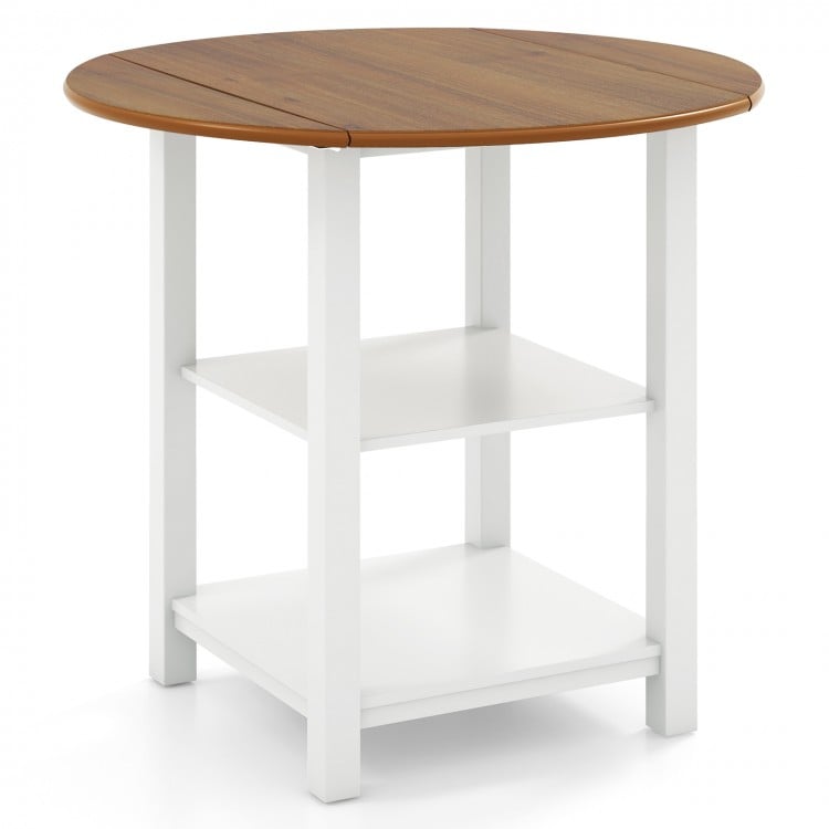 Folding round dining table with acacia wood veneer top and two white storage shelves, perfect for small spaces.