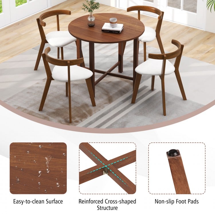 Walnut dual drop leaf dining table with a reinforced cross-shaped structure, perfect for small spaces and easy to clean.