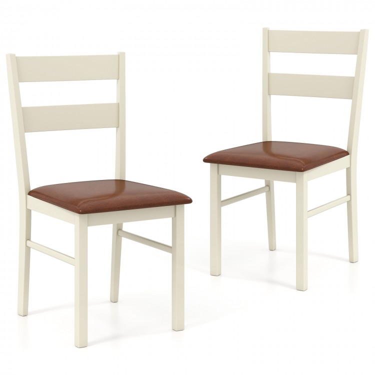 Set of 2 white wooden dining chairs with PU leather upholstery and curved backrests for comfort and style.