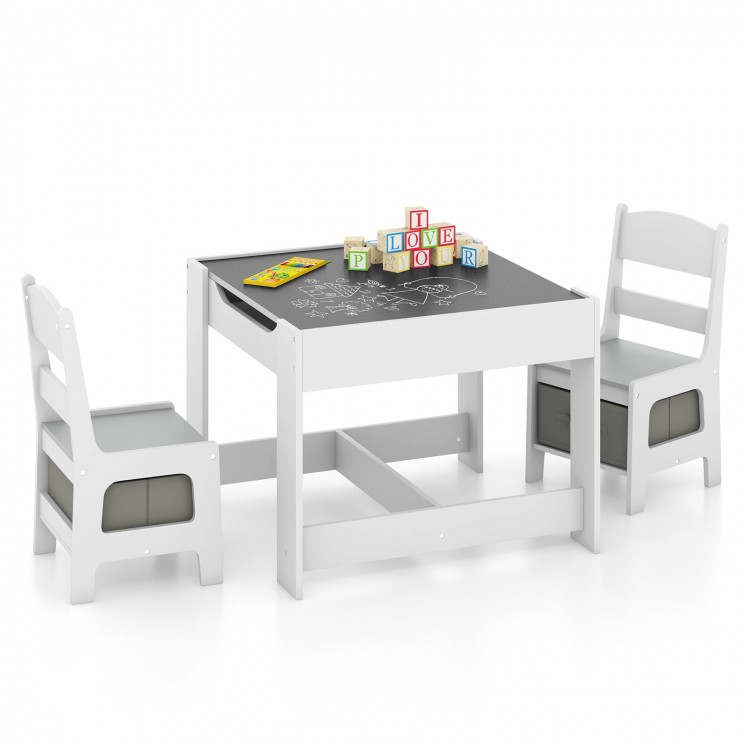 Kids table and chairs set in white with storage boxes and a dual-function blackboard for drawing and writing.