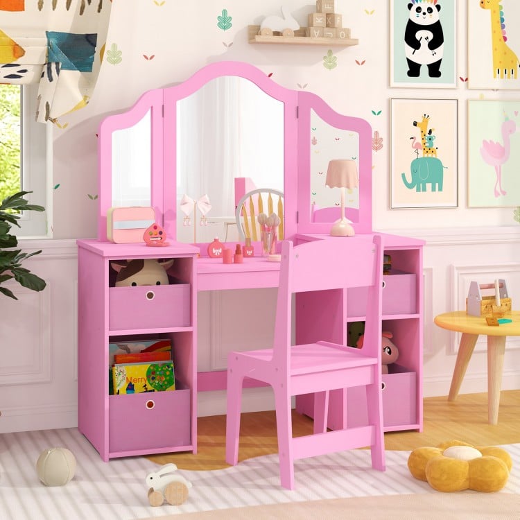 Kids vanity table and chair set in pink with removable mirrors and storage bins, perfect for a child's room.