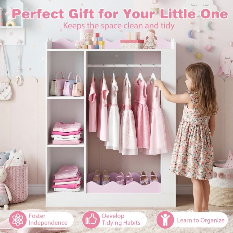 Kids dress up storage in pink with hanging rack, shelves, and mirror, perfect for organizing and fostering independence.