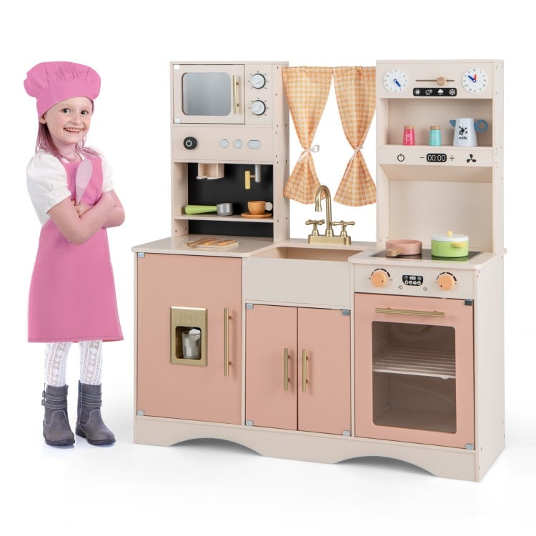 Kids kitchen playset in pink with microwave, coffee maker, and oven, perfect for imaginative play and cooking fun.