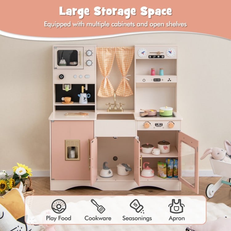 Kids kitchen playset in pink featuring a microwave, coffee maker, and ample storage for imaginative cooking fun.