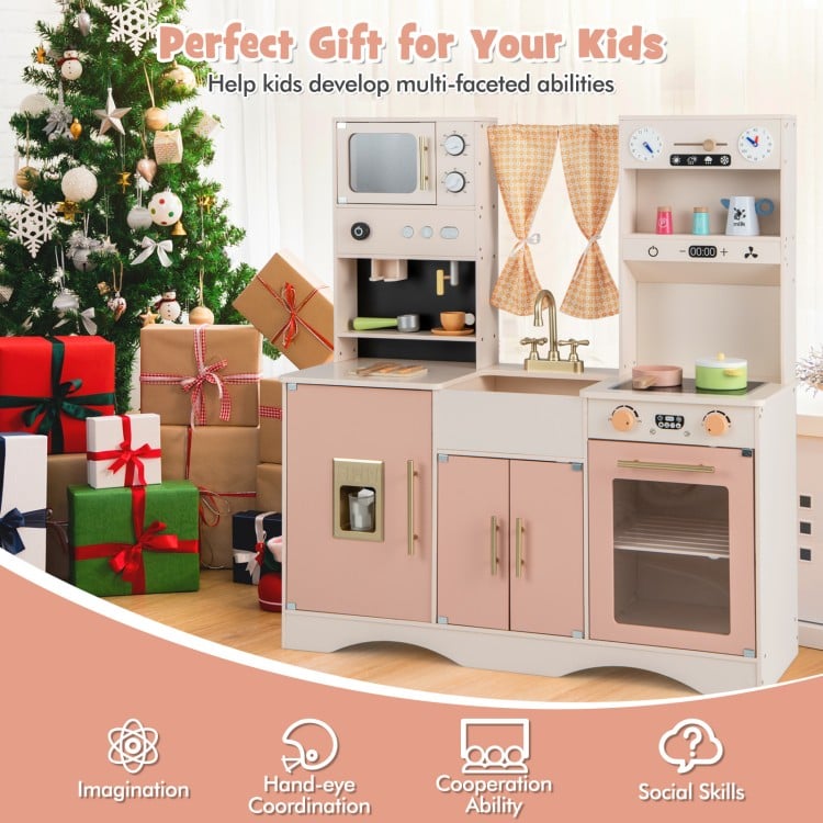 Kids kitchen playset in pink featuring a microwave, coffee maker, and double stoves for imaginative play and skill.