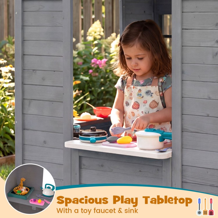 Kids outdoor playhouse with gray wooden cottage, featuring a spacious play tabletop and toy sink for imaginative play.