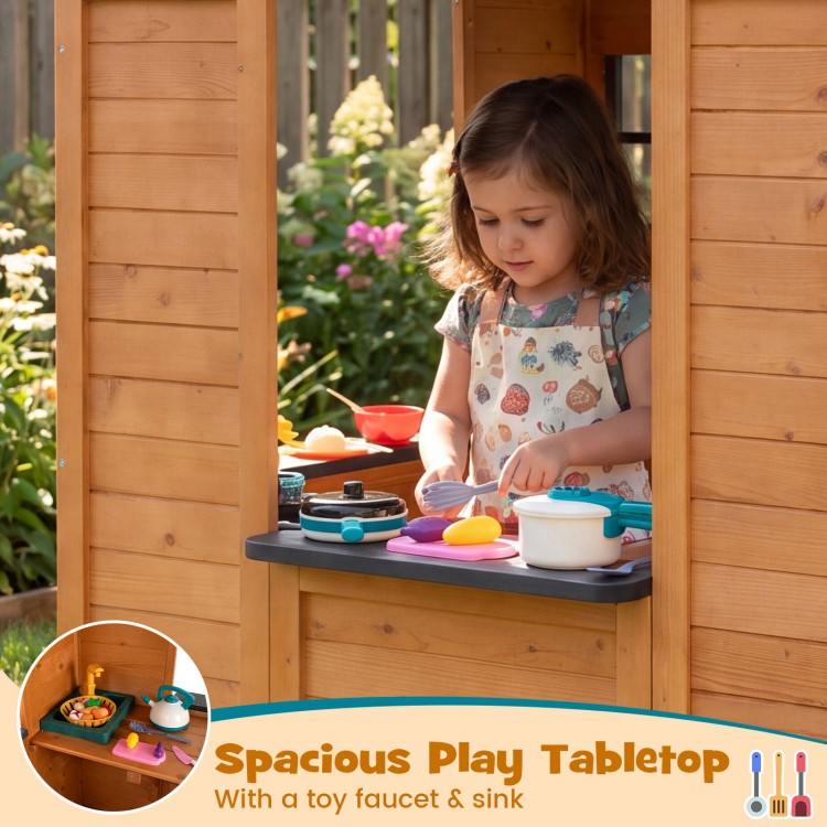 Spacious play tabletop with toy faucet and sink in a wooden playhouse, perfect for kids' pretend cooking fun.