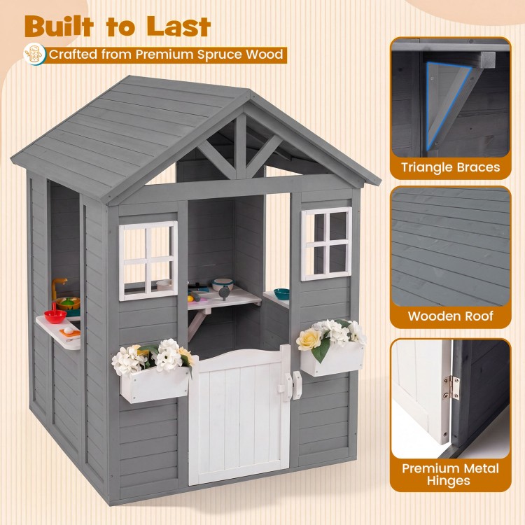 Kids outdoor playhouse in gray spruce wood featuring a half door, sink, and premium metal hinges for durability.