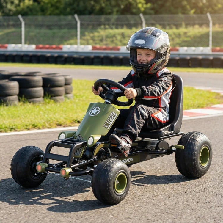 Kids pedal go-kart in green with steering wheel, gear shifter, and handbrake, designed for various surfaces.