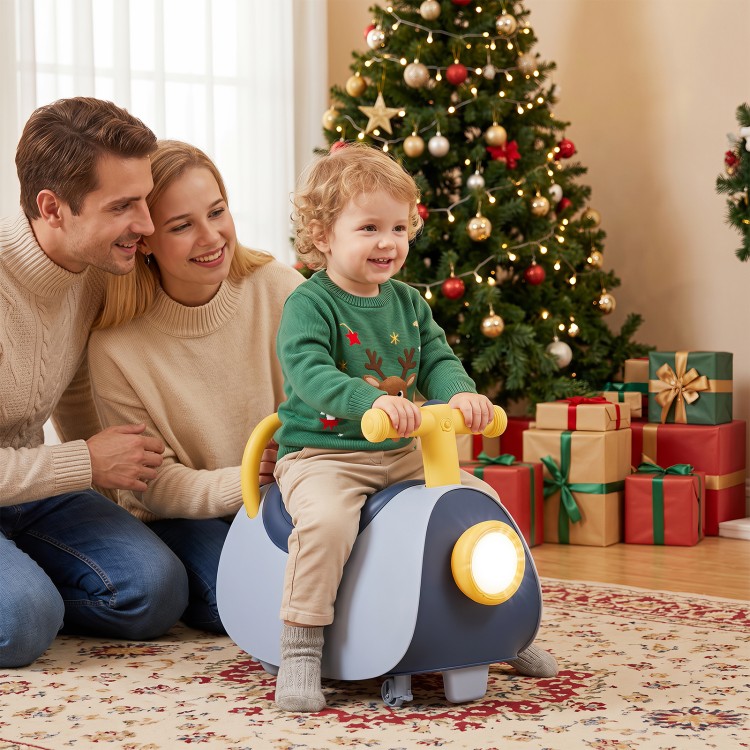 Kids ride-on push car in blue with headlight, music, and under-seat storage, perfect for toddlers aged 18-36 months.