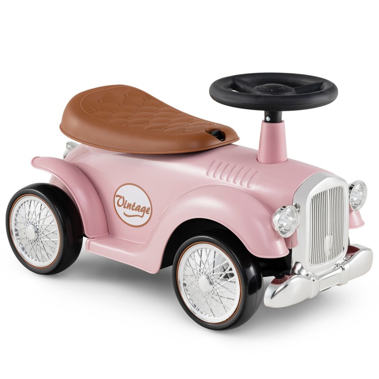 Vintage pink kids' sit-to-stand vehicle with working steering wheel and under-seat storage for fun rides.