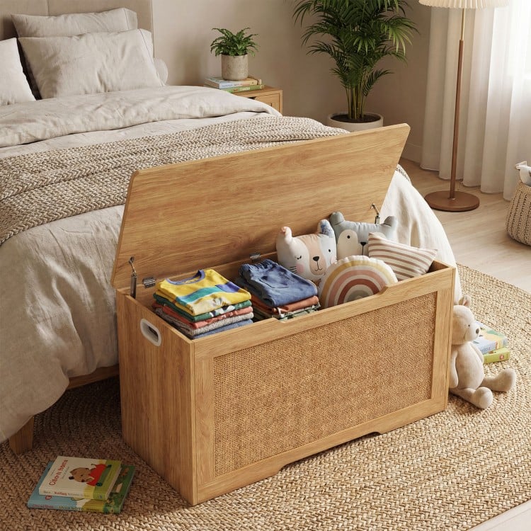 Kids storage bench with flip-top design, rattan texture, and handles, perfect for toys in bedrooms or playrooms.