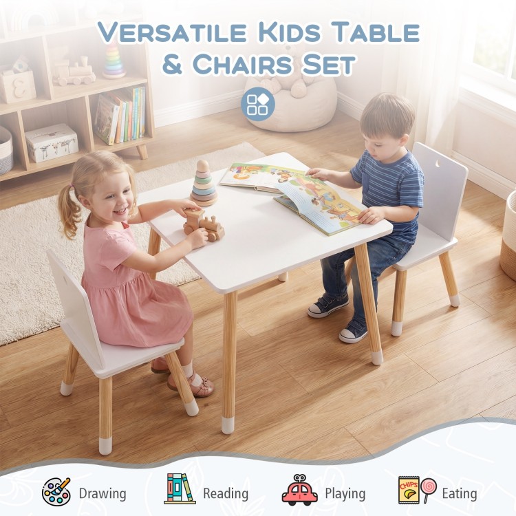Kids wooden table and 2 chairs set in white, perfect for reading, playing, and eating with safe rounded corners.