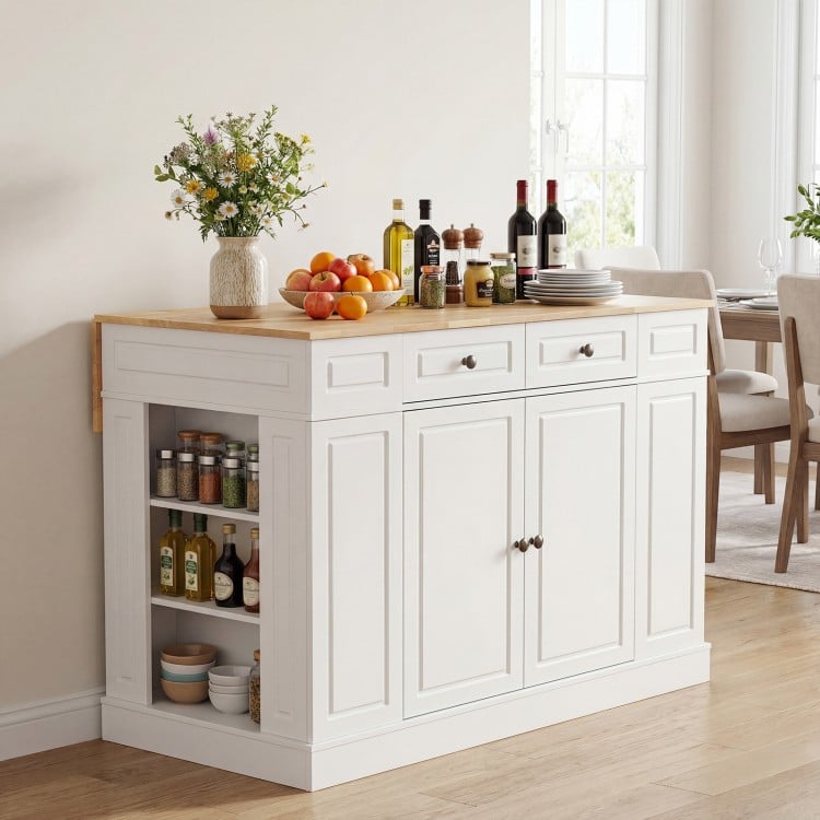 White kitchen island with storage, adjustable shelves, and drop leaf design for versatile dining and kitchen use.