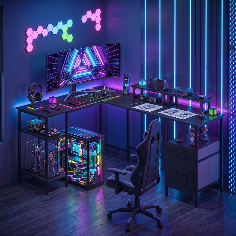L-shaped black desk with monitor stands, built-in charging station, and open shelves for versatile office use.