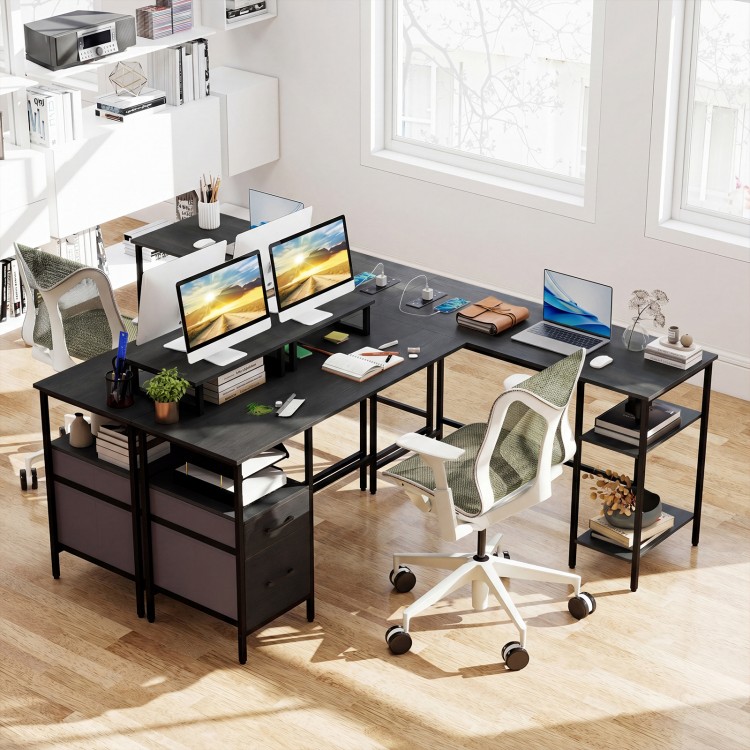L-shaped black desk with monitor stands, adjustable shelves, and built-in power outlet for versatile office use.