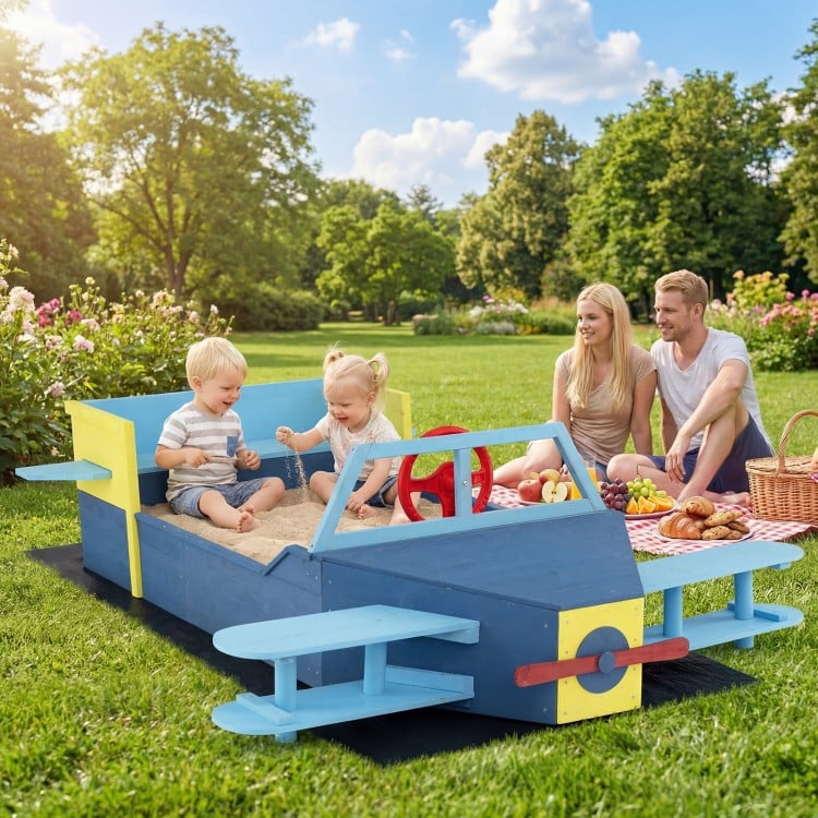 Large blue wooden kids sandbox with bench seat, featuring a colorful propeller and rotatable rudder for imaginative.