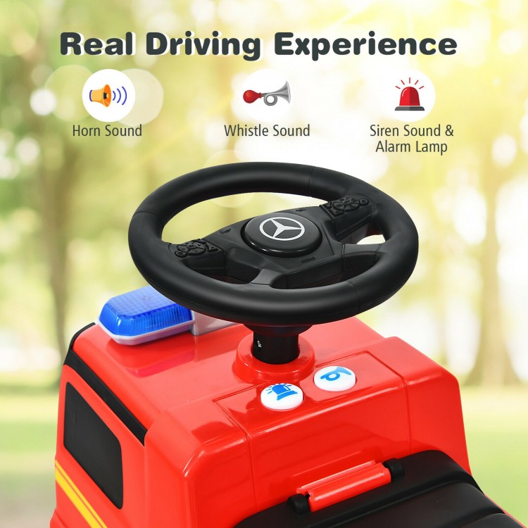 Steering wheel of the licensed Mercedes Benz kids fire engine racer with horn, whistle, and siren sounds for fun play.