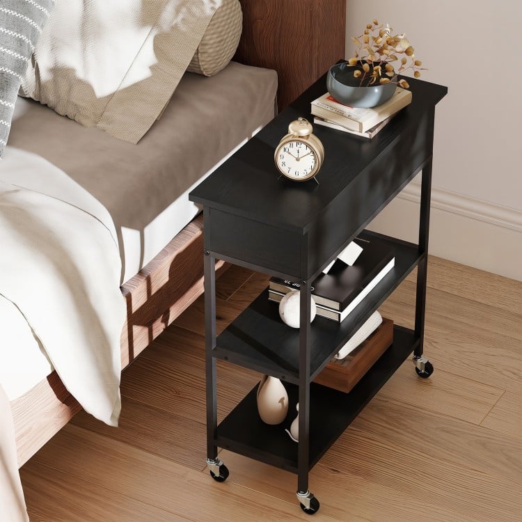 Lift top end table in black with a durable wood surface and a convenient groove design for easy access to power cords.