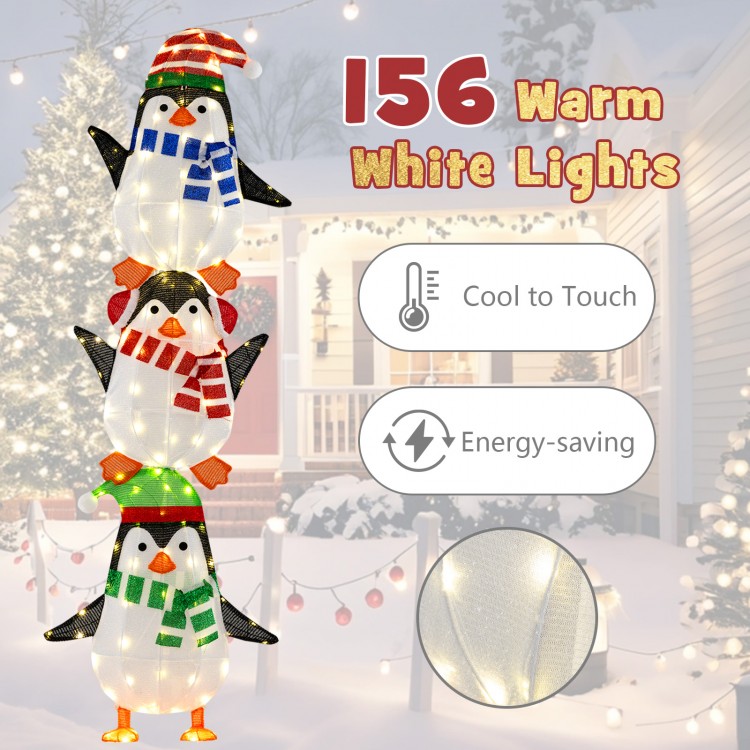Lighted penguin decoration with 156 warm white lights, cute hats, and energy-saving LED for festive outdoor display.