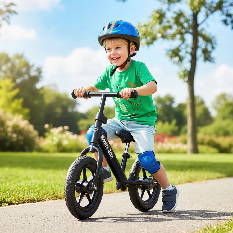 Lightweight toddler balance bike in black with adjustable seat, 11" puncture-free tires, perfect for outdoor adventures.