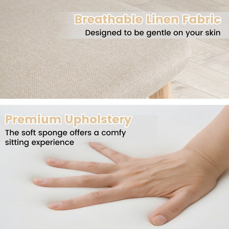 Close-up of the linen fabric upholstery on a modern dining chair, showcasing its soft texture and premium comfort.